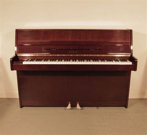 Kawai CX 4S Upright Piano For Sale With A Mahogany Case And Brass