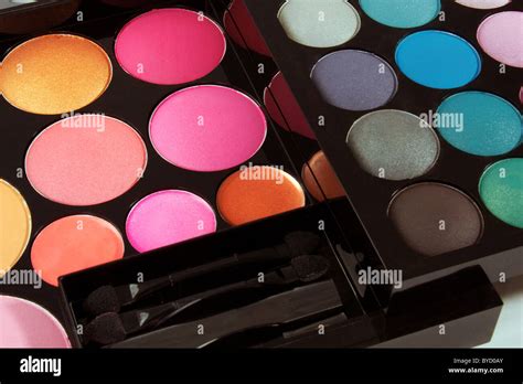 A Collection Of Cosmetics Eye Shadows Blushers And Powders In A Modern