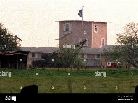 An Armored Vehicle Drives Past The Branch Davidian Compound Near Waco