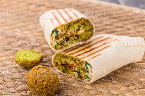 Tortilla Falafel Shawarma Wraps Served In Dish Isolated On Table Side View Of Arabic Food Stock