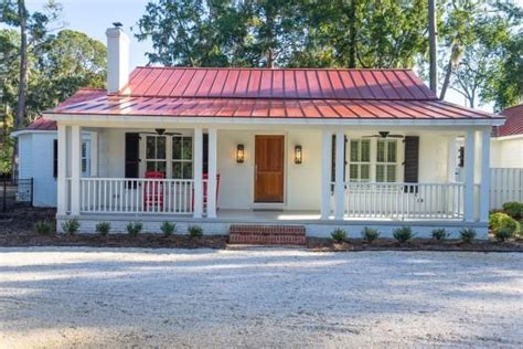 Check out this classic ranch home with metal roofing on HGTV.com. | Ranch house exterior, Red ...