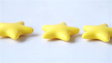 Star shaped rubber toys close up 13483276 Stock Video at Vecteezy