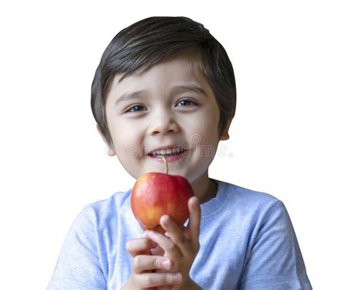 Portrait Of Healthy Kid Holding Organic Red Apple On His Hand And