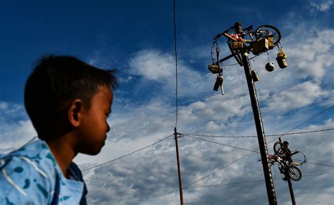 CCTV On Twitter Photos Show Participants Climb Greasy Poles During