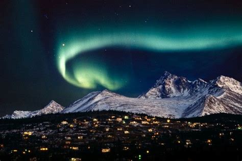 Aurora Borealis over hillside neighborhood & Chugach Mountains ...