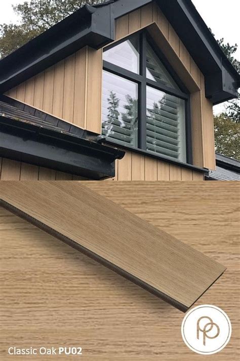 The Side Of A House With Wood Shingles And Window Sill On Top Of It