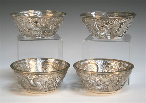 A Set Of Four Early 20th Century Chinese Silver Finger Bowls Each