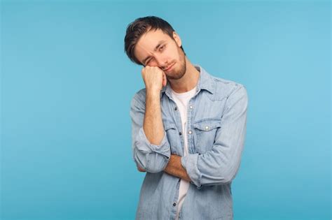 Premium Photo Portrait Of Unhappy Depressed Man Feeling Bored With