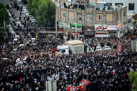 Tens Of Thousands Gather For Raisi Funeral Procession In Tehran