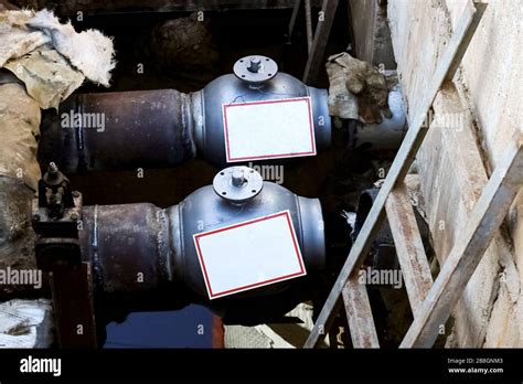 Insulated Pipes For Hot Water And Valve Underground Closeup Stock Photo Alamy