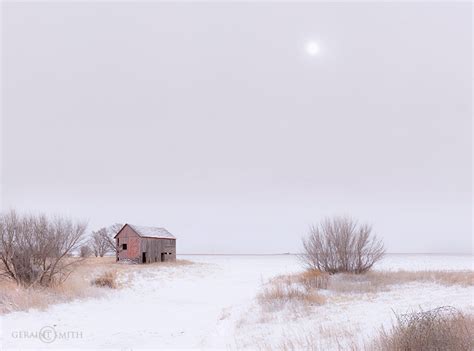 Winter fields, red barn, San Luis Valley, Volcanic Plateau Colorado.