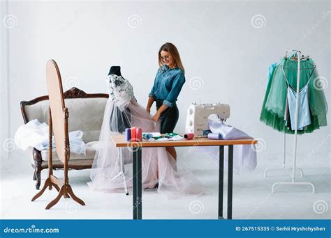 Attractive Female Fashion Designer Is Working In Her Workshop Stylish