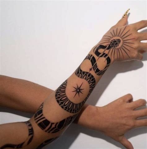 Creative Spooky Ink Chic Body Art Concepts Edgy Hand Tattoo Styles