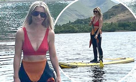 Helen Skelton Flashes Her VERY Toned Abs In A Red Bikini As She Tries Her Hand At Paddle