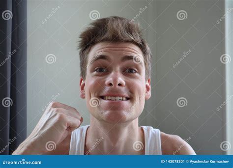 Portrait Of Attractive Young Man With Satisfied Expression White