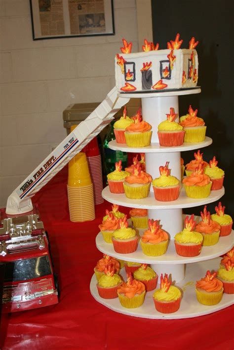 Fireman Burning House Cake With Flame Cupcakes For Grooms Party