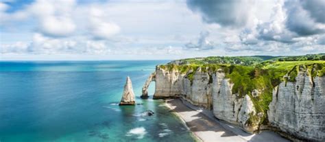 An Aerial View Of The Beach And Cliffs