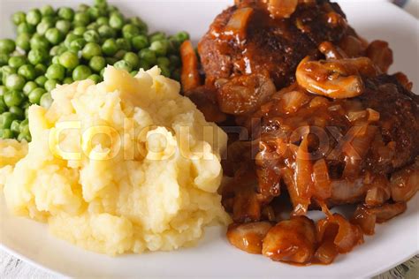 Salisbury Steak With Mashed Potatoes And Green Peas Close Up Horizontal Stock Image Colourbox