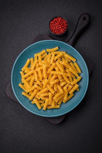 Premium Photo Raw Fusilli Pasta From Whole Grain Wheat Varieties