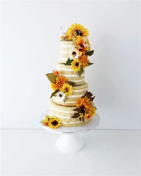 Elegant Naked Wedding Cake With Beautiful Flowers