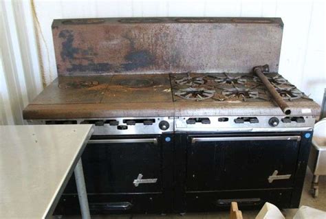 LARGE COMMERCIAL STOVE/OVEN - Auctioneer Express