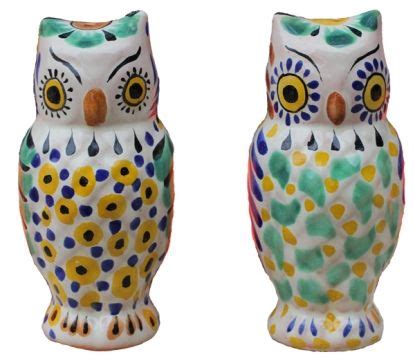 Two Ceramic Owl Figurines Sitting Next To Each Other