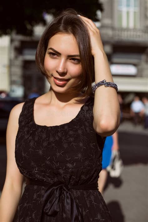Gorgeous Brunette Model With Naked Back Posing With Contrast Light Black And White Toning Stock
