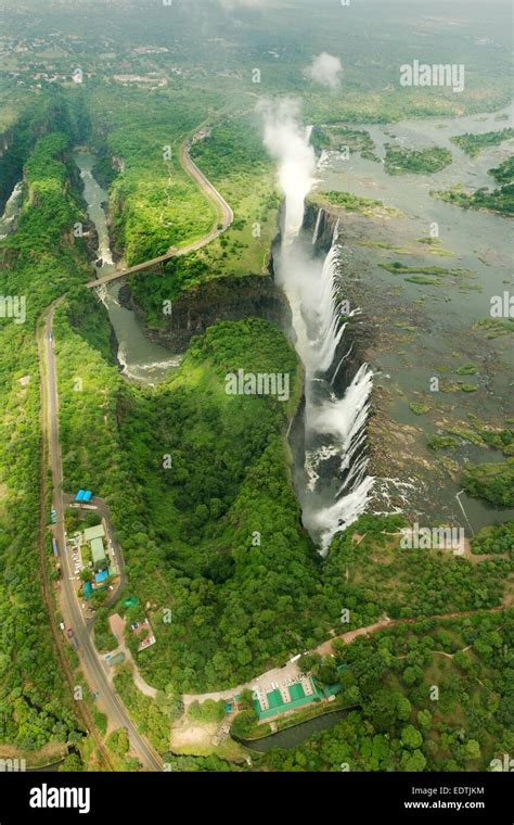 Aerial Image Of The Victoria Falls And The Spray Taken From The Zambian