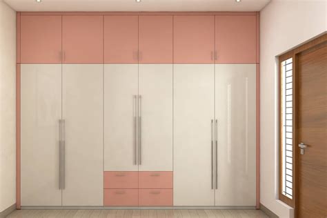 Cream And Peach Swing Wardrobe Design Livspace