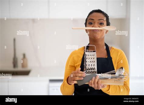 Cheerful Busy Funny Millennial African American Woman Chef In Apron