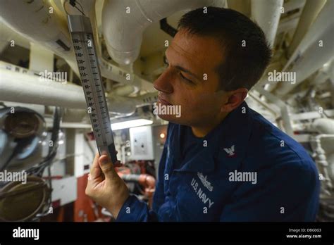 Us Navy Electronics Technician 3rd Class Jonathan Stremel Checks