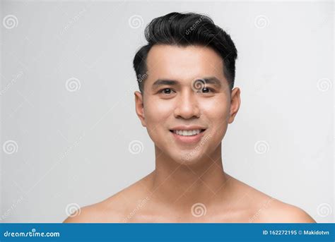 Photo Of Smiling Mature Man Standing Isolated Over White Wall