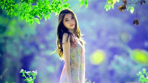 Beautiful Girl Model Is Standing In Blur Blue Background Wearing Colorful Dress Hd Girls