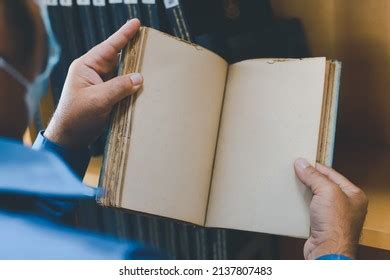 Man Holding Open Book Blank Pages Stock Photo Shutterstock