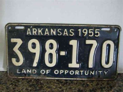 vintage ARKANSAS RAZORBACKS embossed license plate