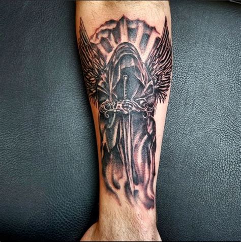 15 of the best guardian angel tattoo designs and ideas that everyone should try - YEN.COM.GH