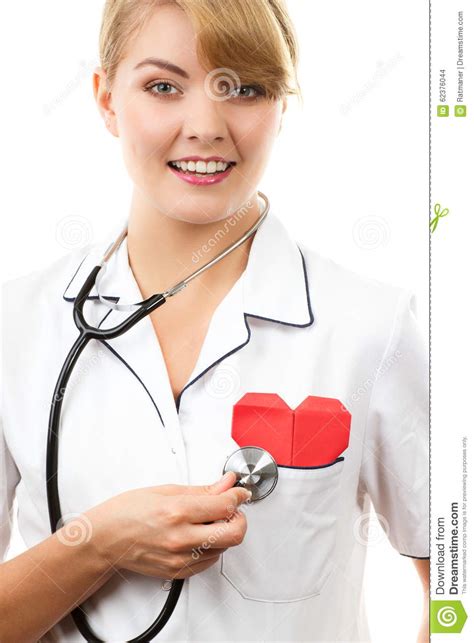 Woman Doctor With Stethoscope Examining Red Heart Healthcare Concept