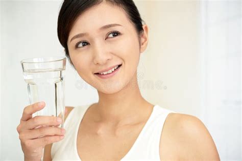 Woman Drinking A Glass Of Water Stock Image Image Of Face Home 91770797