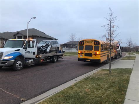 School Bus Hits Car Nearly Strikes Home