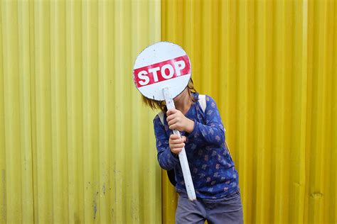 "Portrait Of A Child Boy Holding A STOP Sign" by Stocksy Contributor ...