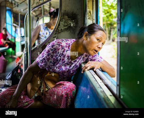 Yangon Yangon Region Myanmar 25th Nov 2017 A Woman Looks Out The Window On The Yangon