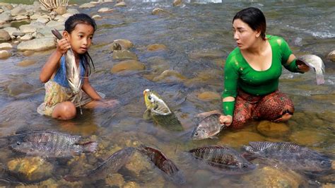 Survival In Forest Skills Catch Fish By River Grilled Fish With Mango