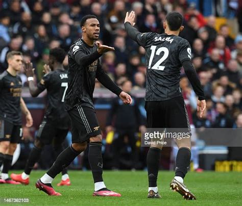 Gabriel Magalhaes And William Saliba Of Arsenal Gesture To Each Other