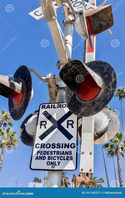 Railroad Crossing Sign And Lights Against Blue Sky Stock Image Image