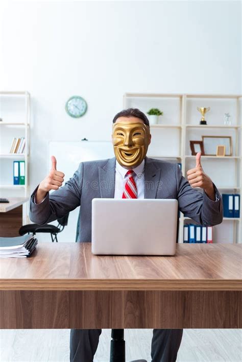 Businessman Wearing Mask In Hypocrisy Concept Stock Photo Image Of