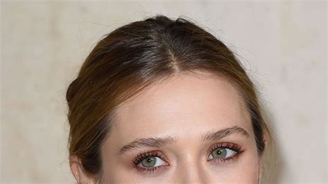 The Stealth Impact Of Rosy Nude Makeup Elizabeth Olsen S Front Row Look At Dior Haute Couture