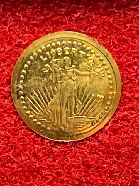 The Smallest Gold Coin In The World 333 8 Kt Gold Catawiki