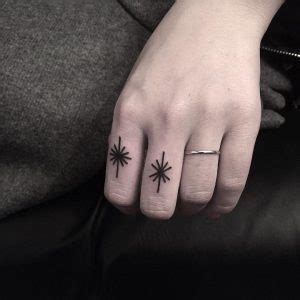 Tiger And Raccoon Tattoos On Fingers Tattoogrid Net