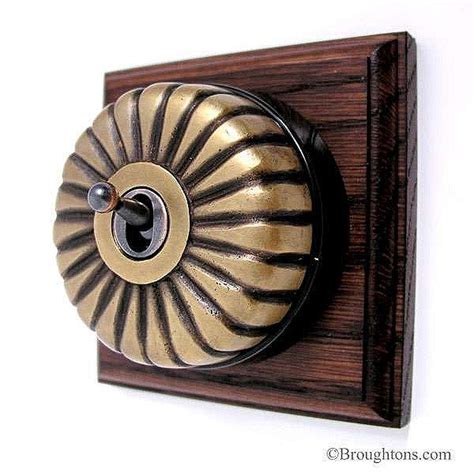 Fluted Dome Dolly Light Switch On Plinth 1 Gang Antique Satin Brass Light Switch Satin Brass