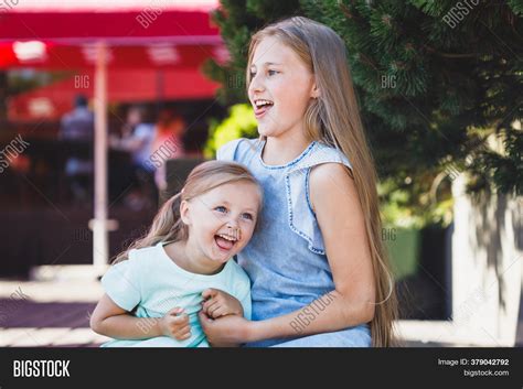 Older Sister Tickles Image And Photo Free Trial Bigstock